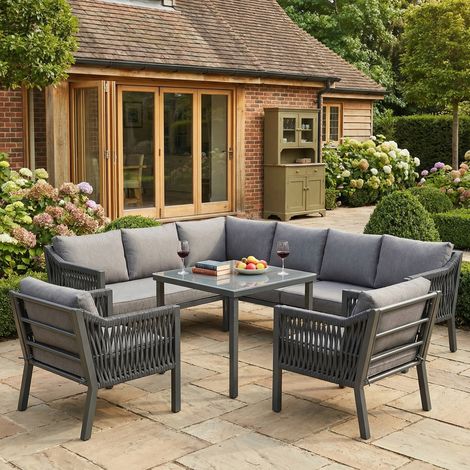 Salon de jardin repas 8 personnes gris avec canapé d’angle, 2 fauteuils et table plateau verre, structure fer galvanisé et corde tressée
