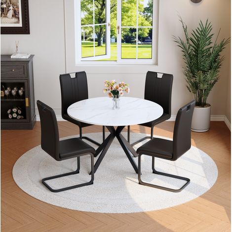 Conjunto de comedor de 3 piezas: mesa redonda efecto mármol blanco y 2 sillas negras de PU, metal (1/5)