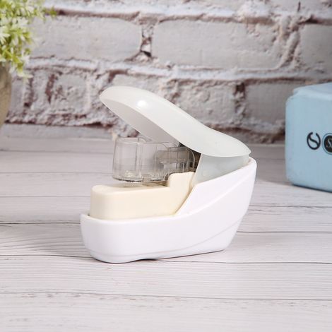 Agrafeuse sans agrafes, pratique et sans aiguille, idéale pour les fournitures de bureau et les écoles. (1/3)