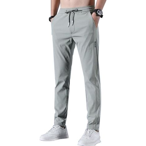 Schnelltrocknende, dehnbare und atmungsaktive Sporthose für Herren, ideal zum Laufen und Joggen. Mit Kordelzug und Taschen. Größe 2XL, grün. (1/5)