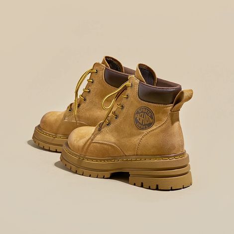 Bottes courtes jaunes de travail, chelsea boots décontractées pour femme, chaussures de sécurité robustes, idéales pour le quotidien, confortables et résistantes. (1/2)