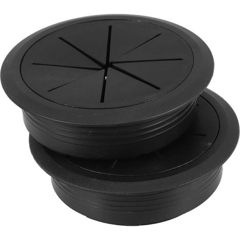 Deux passe-câbles noirs pour bureau, permettant une gestion et une organisation optimales des câbles. (1/5)