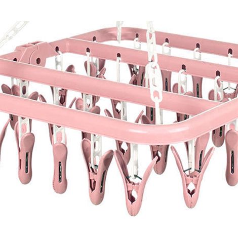 Porte-serviettes pliant 32 pinces, rotation 360°, système anti-vent, séchoir à linge compact rose (1/5)