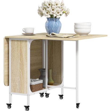 Table de salle à manger pliante pour 6 personnes maximum avec étagère, en bois et métal, 130 x 80 x 74 cm, coloris blanc et bois.