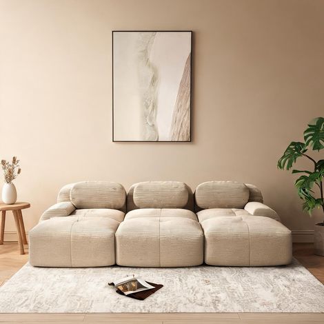 Sofa modulaire beige en velours côtelé avec poufs en corduroy (1/5)