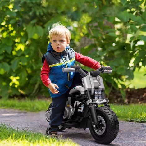 Moto électrique pour enfants avec phares, musique, klaxon, vitesse de 3 km/h, pour les enfants de 3 à 5 ans, 86 x 44 x 58 cm, noir et blanc