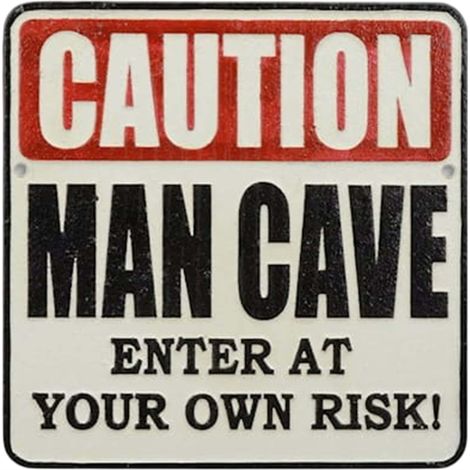 Letrero de hierro fundido con advertencia para cuevas de hombres.