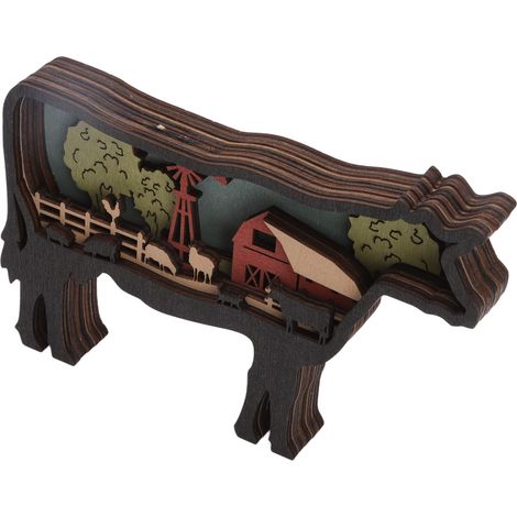 Décoration murale artisanale en bois découpé représentant des animaux de la ferme, à plusieurs niveaux, avec des sculptures de bovins. (1/5)