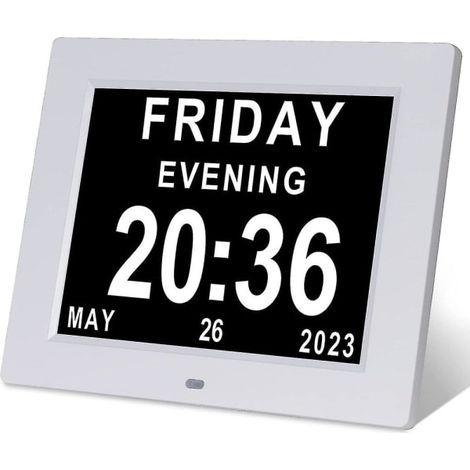 Horloge avec calendrier numérique grand format pour les personnes âgées atteintes de démence ou de la maladie d'Alzheimer, affichant le jour et la date.