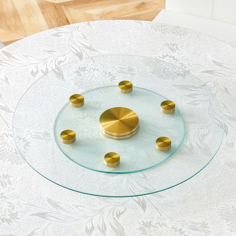 Mesa. Tablero de cristal redondo giratorio de dos niveles. El diámetro del cristal superior es de 61 cm, y el del inferior de 38 cm. Su diseño giratorio facilita la recogida y colocación de objetos. (1/5)