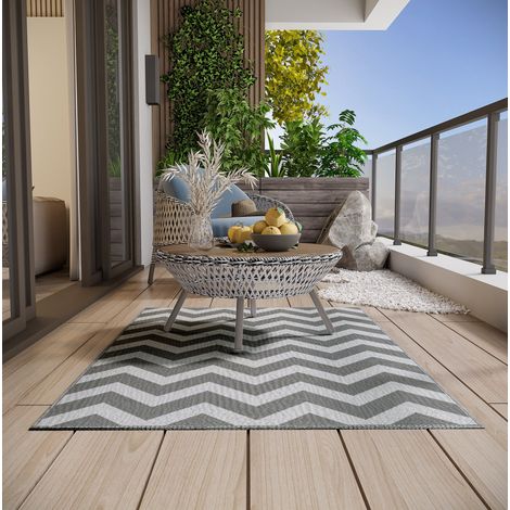 Tapis extérieur imperméable en polypropylène 121 x 182 cm, gris clair et blanc, réversible HAVRYA (1/5)