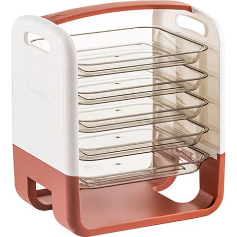 Étagère à légumes à quatre niveaux avec tiroir intégré, en plastique rose. (1/5)