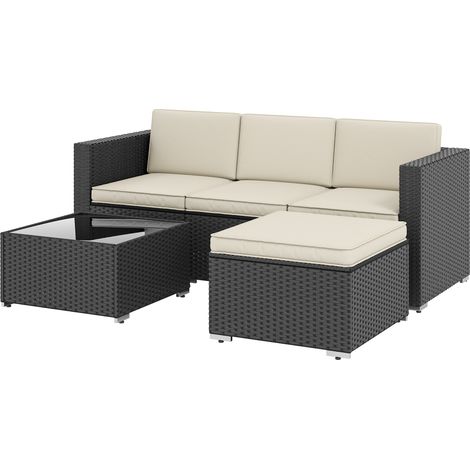 Ensemble de mobilier de jardin en rotin comprenant un canapé 3 places, un pouf et une table basse avec plateau en verre noir. (1/5)
