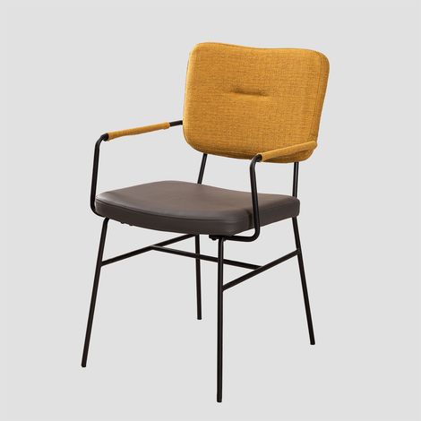 Silla de comedor con reposabrazos en polipiel y acero Milih SKLUM             