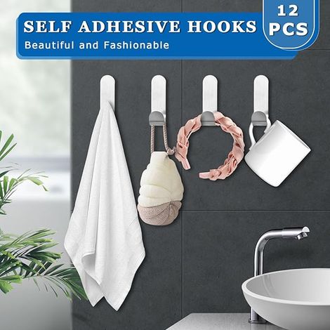 Sollbry Ganchos adhesivos de acero inoxidable, 12 piezas, ganchos autoadhesivos para pared de baño, ganchos adhesivos para colgar en la cocina, sala de estar y dormitorio. (1/5)