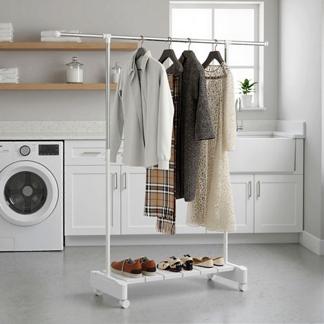 Piano porta scarpe extensible Stendino bianco 4 étagères, modèle 2025, structure acier inoxydable, grille séchage linge avec roulettes freinées. (1/5)