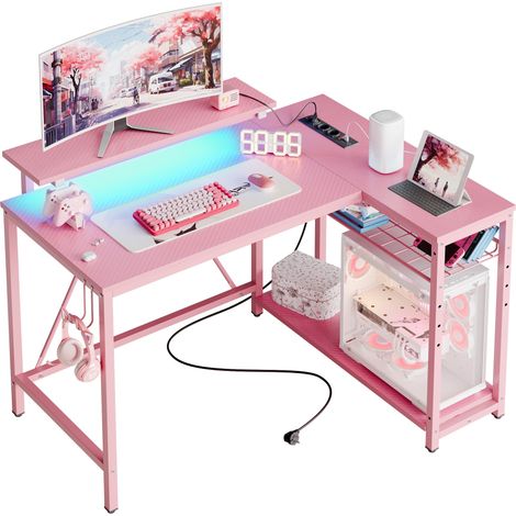 Bureau d'angle en L Bestier avec prises et éclairage LED, bureau d'ordinateur réversible avec étagères et crochets, bureau compact pour bureau à domicile (fibre de carbone rose 3D, 106 cm) (1/4)