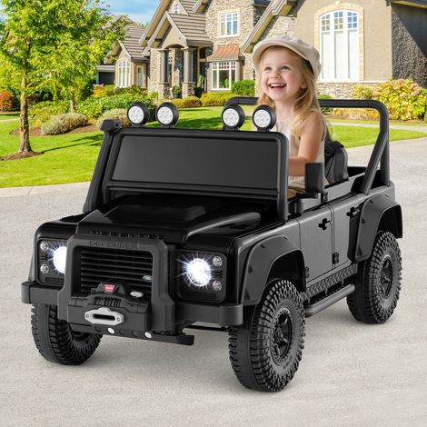 Voiture électrique enfant noire Land Rover Defender avec télécommande parentale, ceinture et phares LED pour jardin, parc et cour (1/5)
