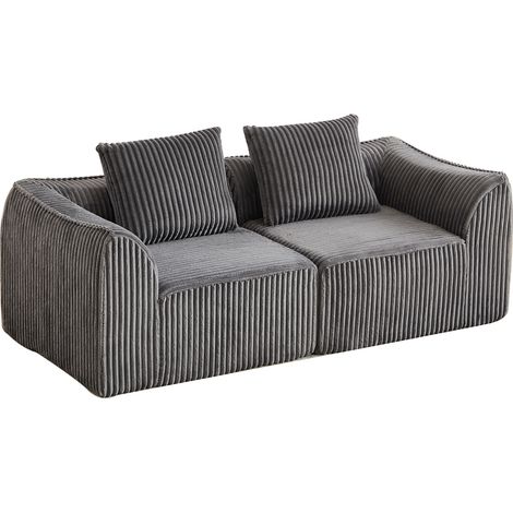 Sofá modular de pana gris con líneas curvas y respaldo suavemente inclinado, con 2 cojines (1/5)