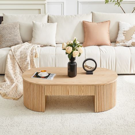 Mesa de centro ovalada con cajón, laterales estriados y ranurados, para salón, estructura de MDF con efecto madera clara. (1/5)