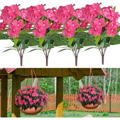 Four artificial impatiens plants, suitable for outdoor decoration on terraces, balconies, hanging pots and verandas, in a pinkish red color.