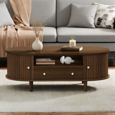 Mesa de centro ovalada de 100x50x36 cm, con cajón y espacio de almacenamiento abierto, puerta corredera, MDF color nogal (1/5)