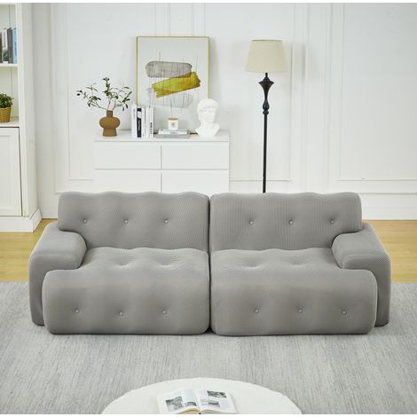 Sofá de 2 plazas XXL de tejido gris, con reposabrazos anchos y respaldo capitoné HAVRYA (1/5)