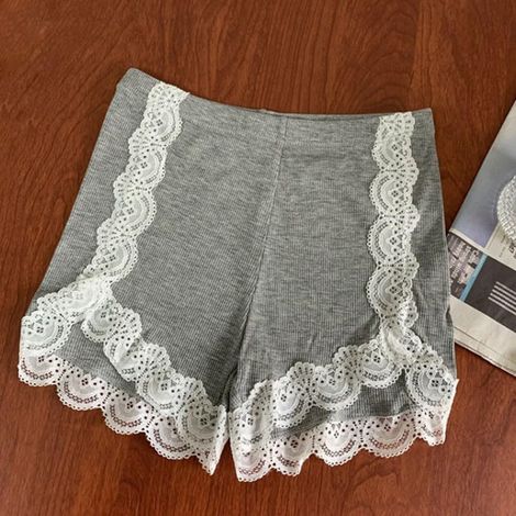 Women's solid-color ice silk shorts with side lace trim for summer vacation, beach, yoga, cycling, casual fashion, regular length, black (1/5)