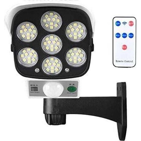 Luz solar para exterior con detector de movimiento inalámbrico y cámara de seguridad ficticia, resistente al agua IP66, foco de pared de 77 LED para patio, jardín, patio, garaje, entrada... (1/4)