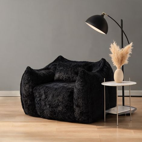 Pouf poire géant en fausse fourrure noire pour salon en faux fur (1/5)