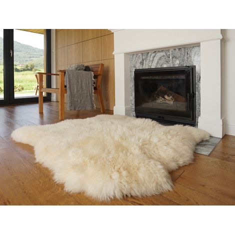 Alfombra XXL de auténtica piel de oveja de 117 x 117 cm, lana blanca natural, reverso de cuero, manta escandinava. (1/5)