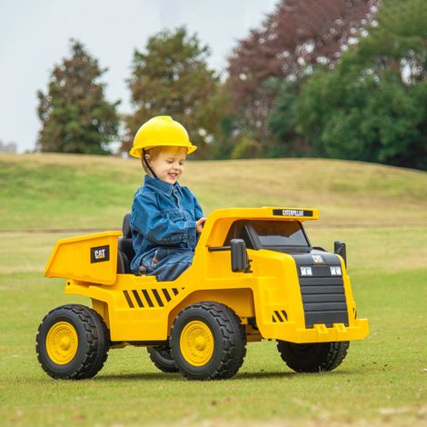 Pelleteuse électrique pour enfants. camion-benne Caterpillar. 3-5 km/h. avec télécommande. 3-6 ans. jaune