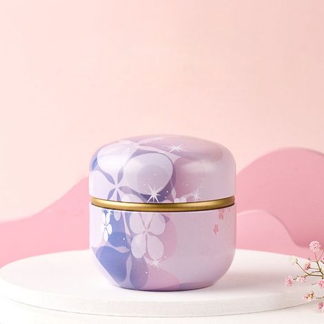 Boîte à thé ronde métal vintage violet clair