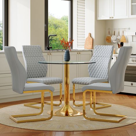 Table ronde en verre 85 cm de diamètre, style luxueux avec pieds dorés, associée à 4 chaises de salle à manger gris clair et or