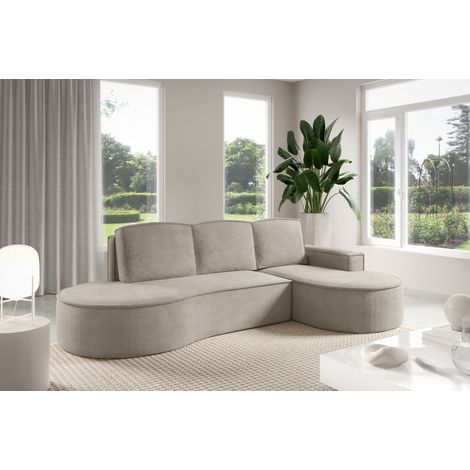 Canapé d'angle Sofello MOLLY aux formes arrondies, revêtu de velours couleur cappuccino : un design tendance et tout en courbes Nouveauté 2025 (avec fonction convertible). (1/5)