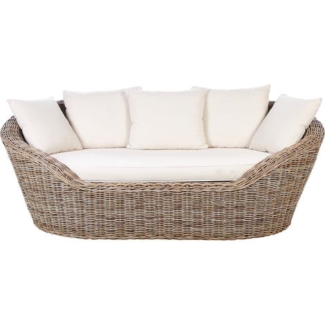 Sofá natural para jardín estilo boho fabricado en ratán en color natural con cojines Cavo (1/5)