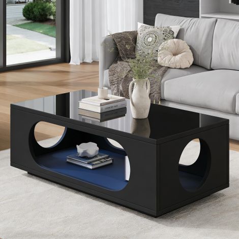 Table basse avec éclairage LED (contrôlé par application)  Structure en MDF  Capacité de charge de 30 kg  Finition haute brillance  Design ouvert  Table d'appoint avec grand espace de rangement  Table