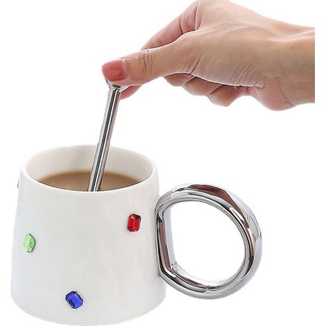 Tasse à café en céramique blanche avec décoration pierre colorée, design simple et élégant pour maison, voyage ou cadeau. (1/5)