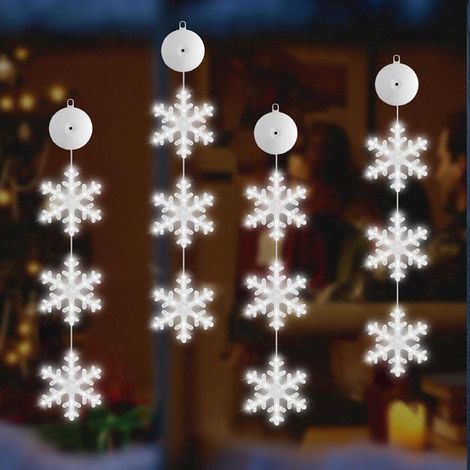 Les guirlandes lumineuses en forme de flocons de neige sont utilisées pour les décorations de Noël. (1/5)