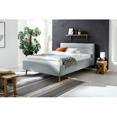 Meise Möbel Stauraumbett Lotte 140x200 cm Bettkasten & Lattenrost Webstoff Eisblau Holzfuß eichefarbig (1/5)