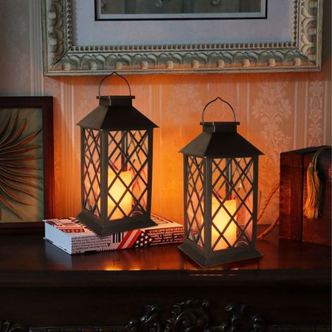 Lampe solaire en 2 parties – bougie LED sans flamme intégrée – lanterne solaire décorative adaptée aux patios. (1/4)
