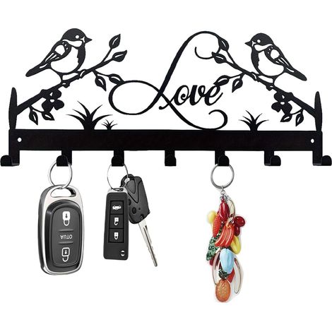 Llavero de pared con 7 ganchos negros en forma de pájaro, ideal para decorar pasillos, cocinas o dormitorios. (1/5)