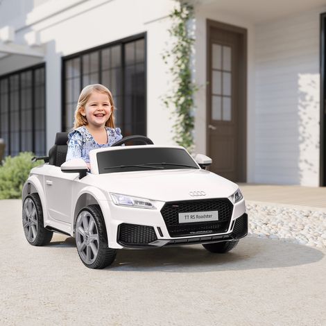 Voiture électrique TT 12V 3-5 ans - klaxon/musique/LED - 2 moteurs - télécommande 2.4G - 3 km/h - blanc