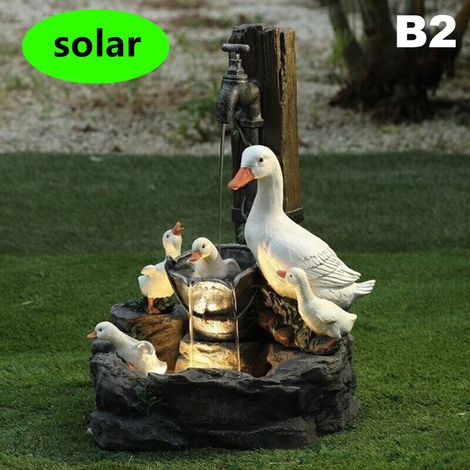 Fontaine de jardin solaire en résine représentant un canard et un écureuil