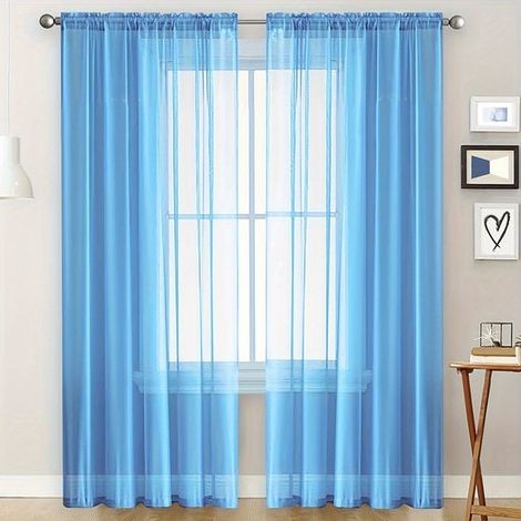 Adatte a camere da letto, soggiorni e per l'uso domestico, queste tende circolari semitrasparenti a due pezzi misurano 132 x 241 cm e sono di colore blu crepuscolo. (1/5)