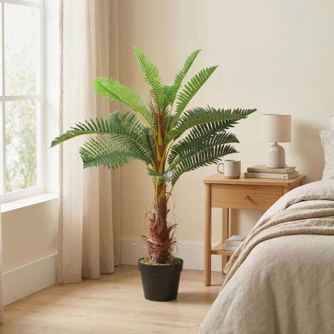 Palmera artificial de 100 cm con 21 hojas de PEVA, planta decorativa con maceta de plástico, color verde. (1/5)