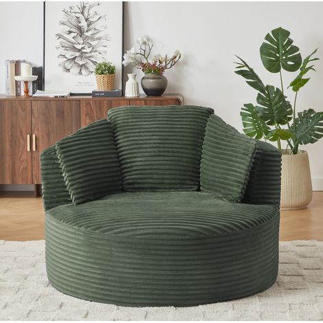 Sillón redondo verde en pana con asiento profundo y respaldo acolchado (1/5)