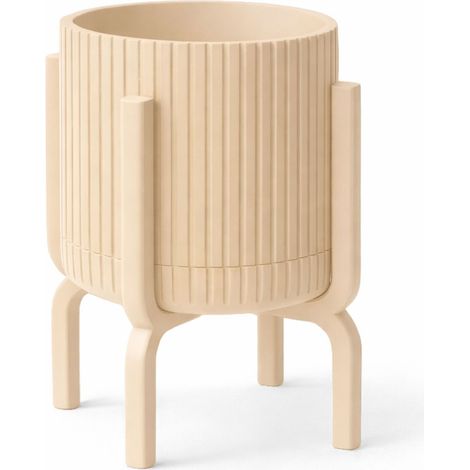 Vaso da fiori moderno, scanalato, di colore beige, con supporto per piante. (1/3)