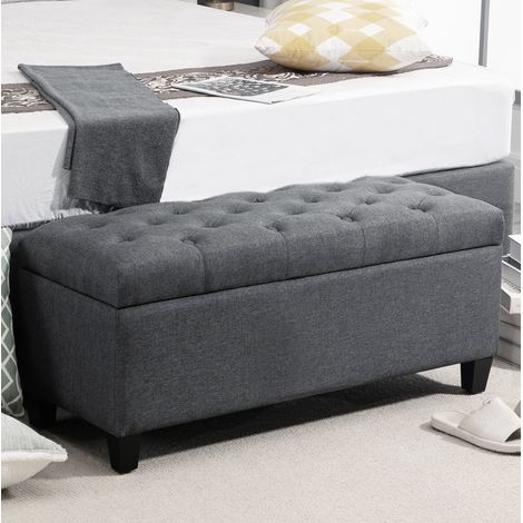 MODFU – Banco arcón acolchado 100x40x44 cm de poliéster con asiento abatible, patas de madera, carga 120 kg y topes antideslizantes – Gris oscuro (1/5)