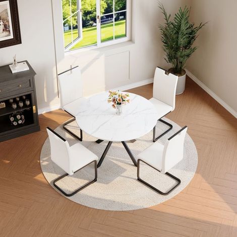 Table et Chaises de Salle à Manger modernes table de ronde effet marbre 4 chaises blanches cuir synthétique cadre métal cantilever (1/5)